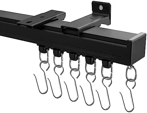 Run a Track Along the Ceiling for a Divider That Glides