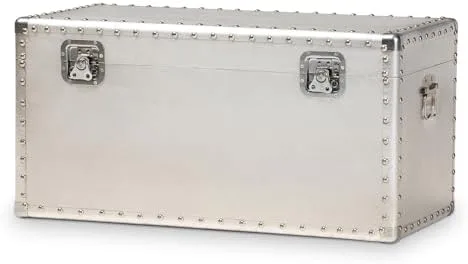 Bring in a Metal Trunk for a Little Contrast Against the Wood