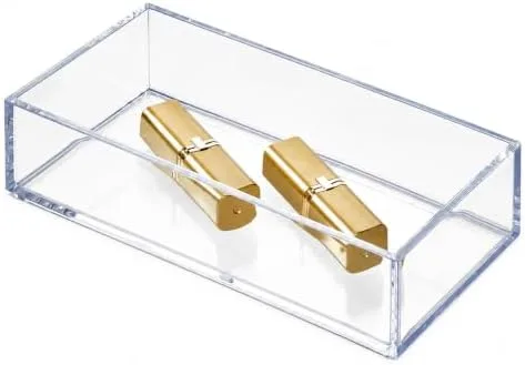 Group Bottles Onto One Tray So the Counter Reads as Styled, Not Cluttered